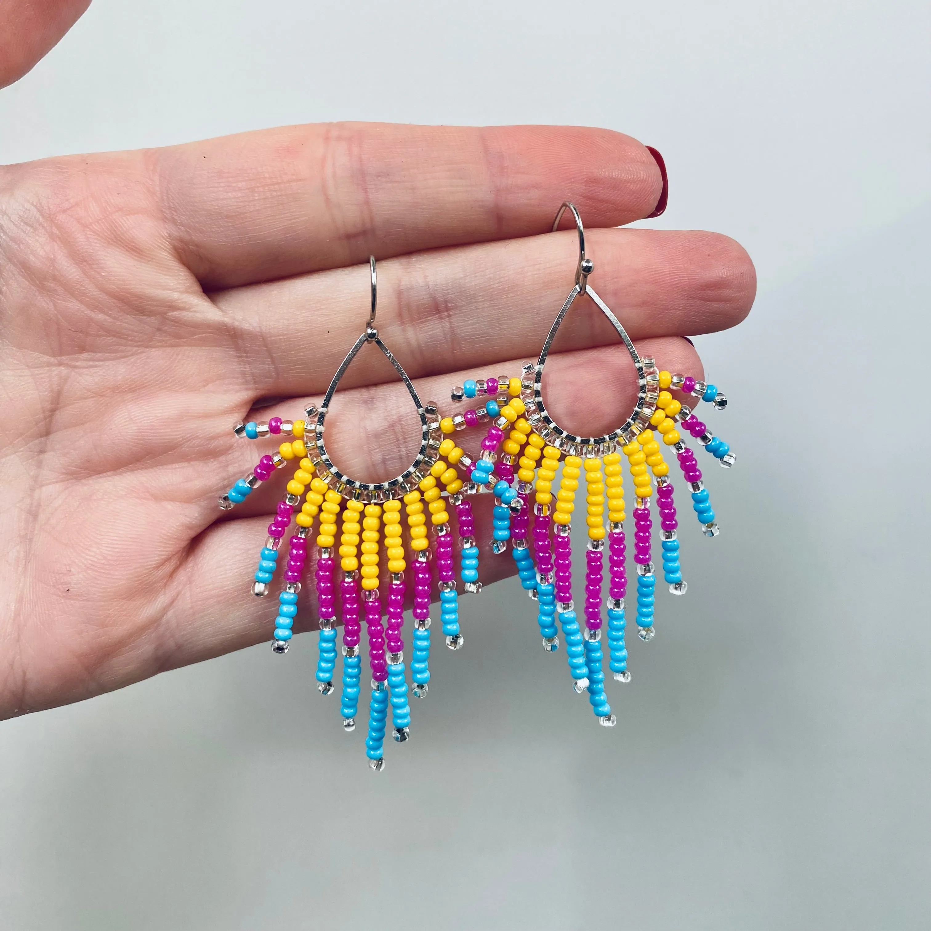 Cool Seed Bead Earrings for Women. Fringe Chandelier Earrings. Long Dangle Earrings. Handmade Unique earrings. Yellow Pink Blue beaded Earring with silver shiny beads.